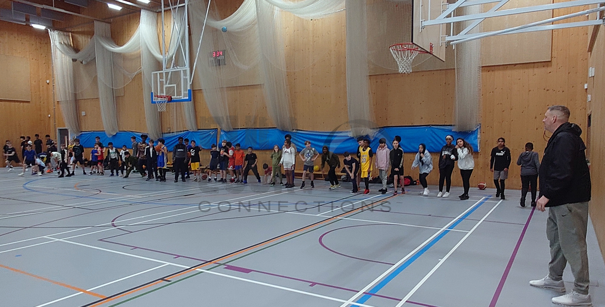 Full Court Connections community basketball session lineup at Uxbridge College