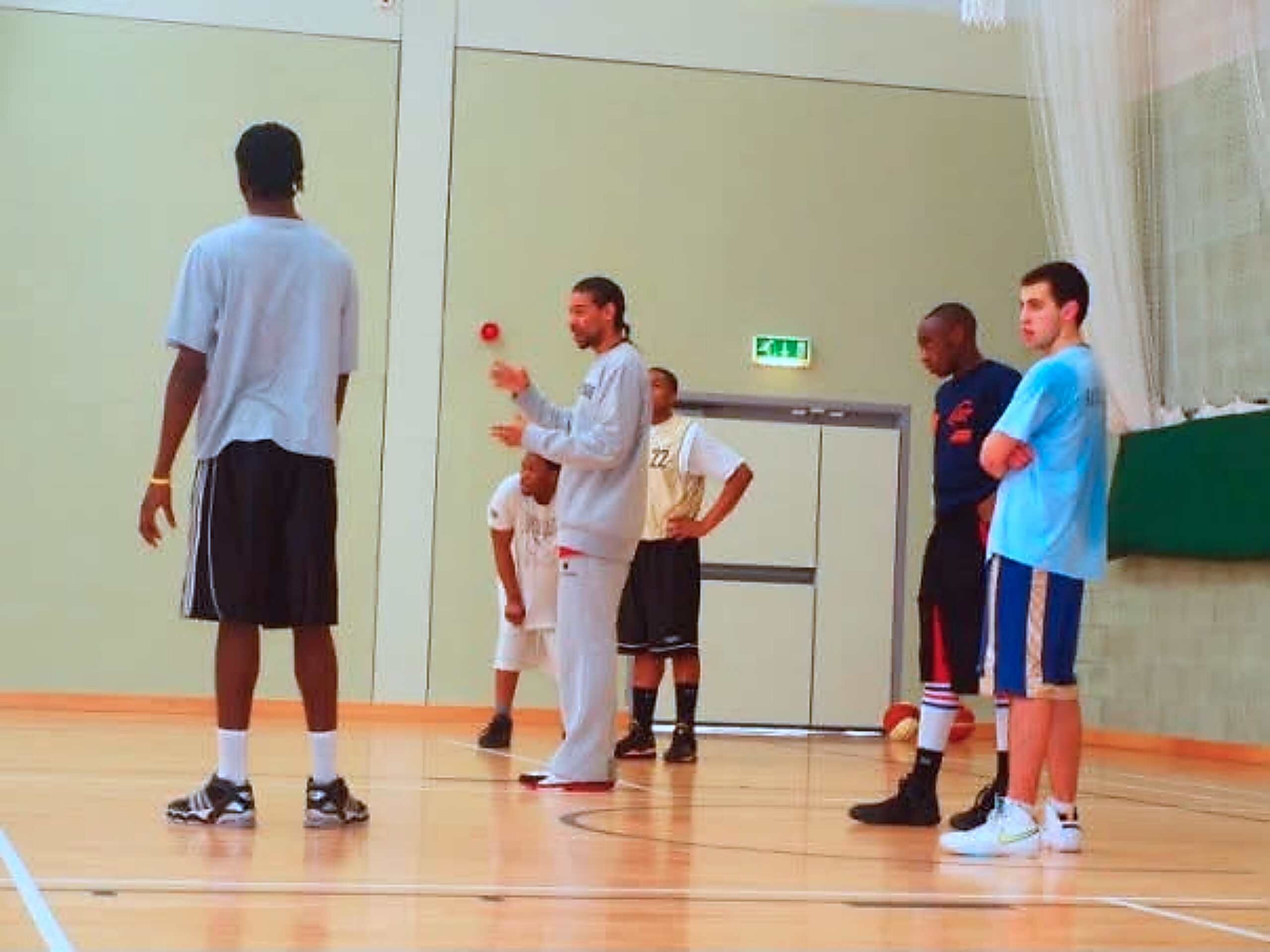 Coach Leon leading a basketball coaching session